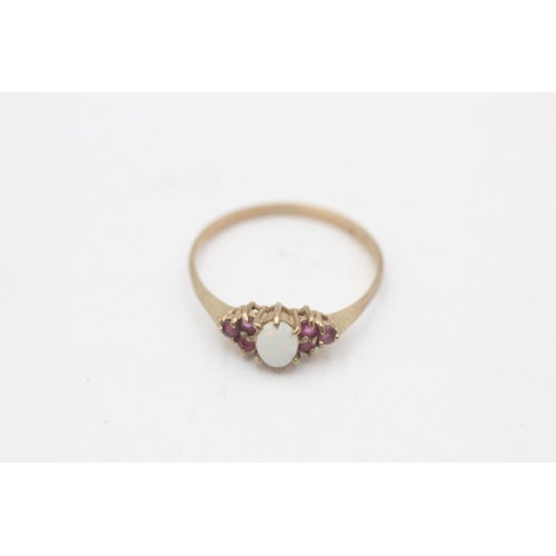 109 - A hallmarked London 9ct gold opal and ruby cluster ring, size P - approx. gross weight 1.1 grams