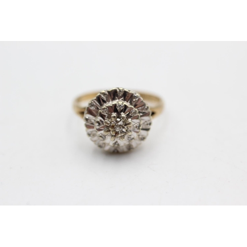 12 - A hallmarked London 9ct two tone gold diamond cluster ring, size K½ - approx. gross weight 3.5 grams