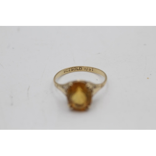 2 - Two 9ct gold gemstone solitaire cocktail rings, one citrine size M½ and one smoky quartz size L½ - a... 