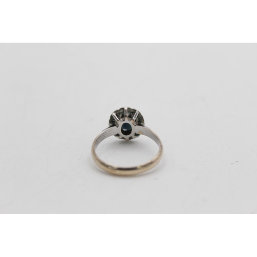 24 - A 9ct gold and silver sapphire and diamond halo dress ring with inner inscription, size Q½ - approx.... 