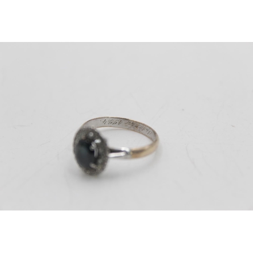 24 - A 9ct gold and silver sapphire and diamond halo dress ring with inner inscription, size Q½ - approx.... 