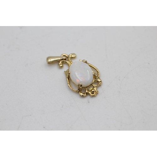 27 - A 9ct gold opal stud earrings and ornate openwork pendant set - approx. gross weight 2.4 grams