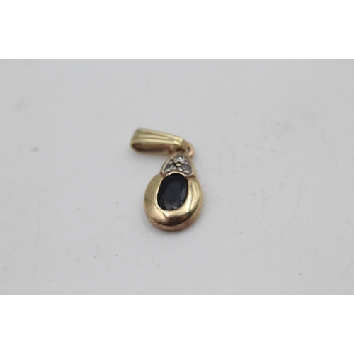 39 - A 9ct gold sapphire and diamond stud earrings and teardrop pendant set - approx. gross weight 2.8 gr... 