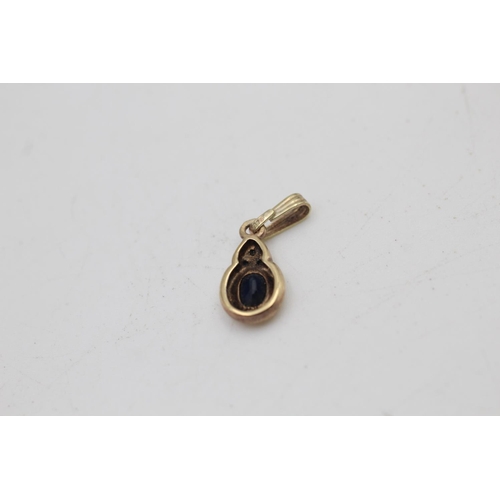 39 - A 9ct gold sapphire and diamond stud earrings and teardrop pendant set - approx. gross weight 2.8 gr... 