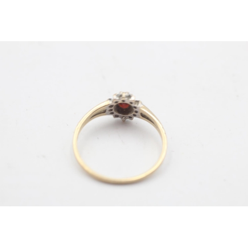 40 - A hallmarked Birmingham 9ct gold garnet and clear gemstone cluster ring, size P½ - approx. gross wei... 