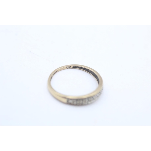 42 - A 9ct gold diamond dress ring, size N½ - approx. gross weight 1.5 grams