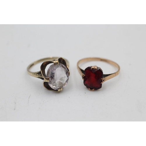 62 - Two 9ct gold gemstone solitaire dress rings, one rock quartz size N and one paste size O½ - approx. ... 