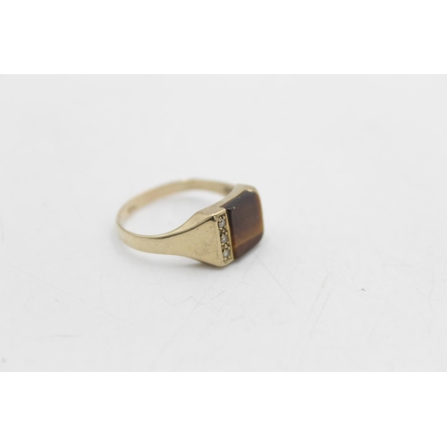 68 - A 9ct gold tigers eye and diamond signet ring, size U½ - approx. gross weight 2.9 grams