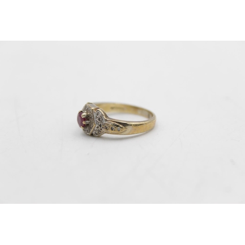 73 - A 9ct gold diamond and ruby dress ring, size L - approx. gross weight 3.3 grams