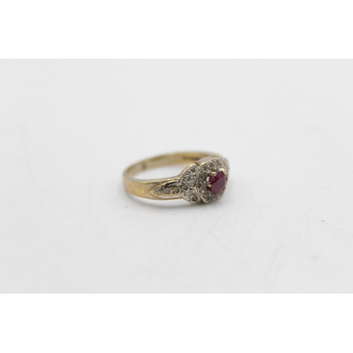 73 - A 9ct gold diamond and ruby dress ring, size L - approx. gross weight 3.3 grams