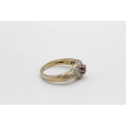 73 - A 9ct gold diamond and ruby dress ring, size L - approx. gross weight 3.3 grams