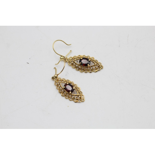 74 - A pair of 9ct gold garnet detail drop earrings - approx. gross weight 2.7 grams