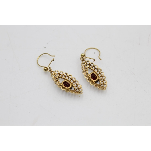 74 - A pair of 9ct gold garnet detail drop earrings - approx. gross weight 2.7 grams