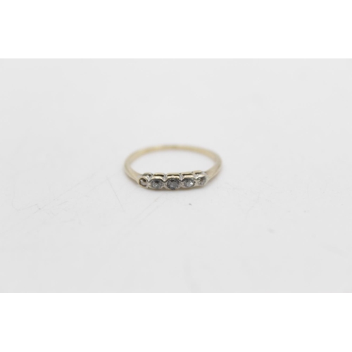 75 - A 14ct gold diamond five stone ring, size L - approx. gross weight 1.2 grams