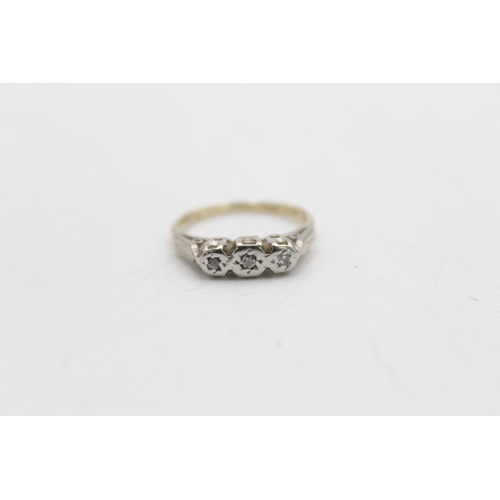 84 - An 18ct gold and white gold diamond trilogy ring, size L - approx. gross weight 3.1 grams