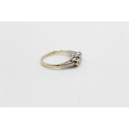 84 - An 18ct gold and white gold diamond trilogy ring, size L - approx. gross weight 3.1 grams