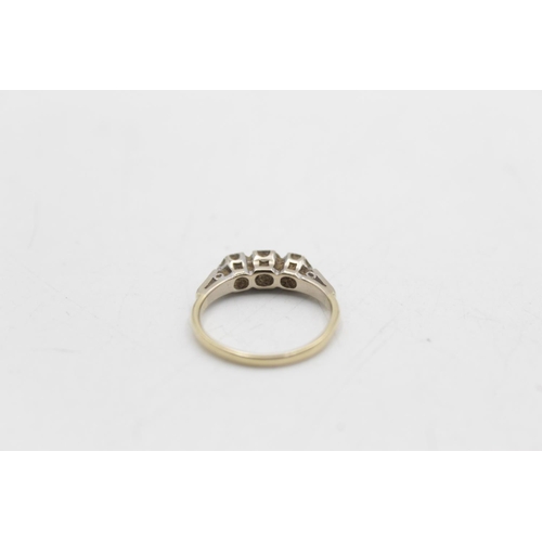 84 - An 18ct gold and white gold diamond trilogy ring, size L - approx. gross weight 3.1 grams