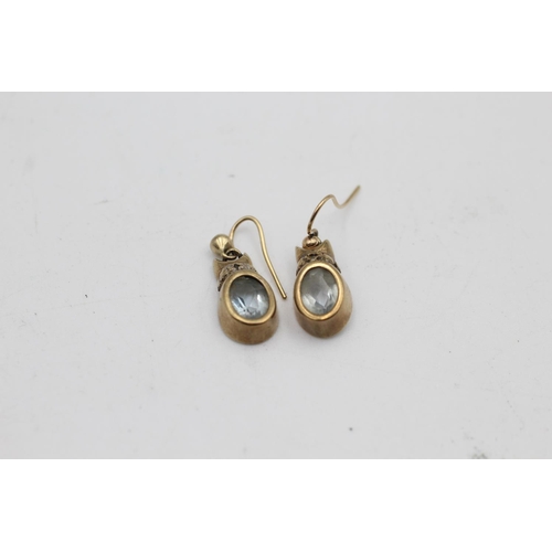 92 - A pair of 9ct gold topaz and diamond French wire drop earrings - approx. gross weight 2.7 grams