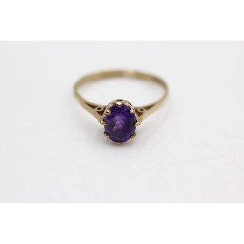 96 - A hallmarked Birmingham 9ct gold amethyst cathedral set solitaire ring, size P - approx. gross weigh... 