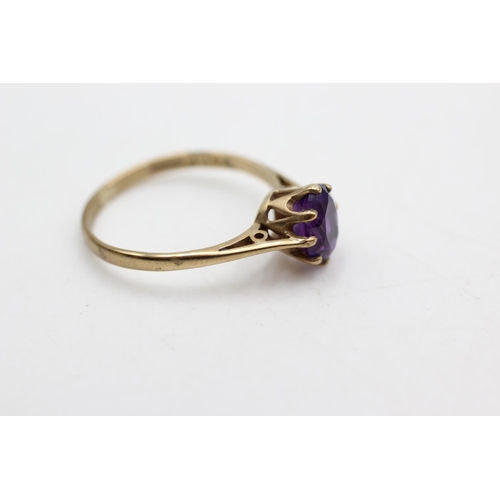 96 - A hallmarked Birmingham 9ct gold amethyst cathedral set solitaire ring, size P - approx. gross weigh... 