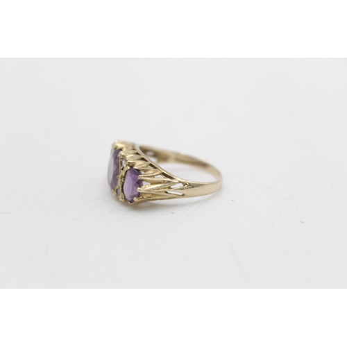 97 - A hallmarked London 9ct gold amethyst and clear gemstone gypsy ring, size P - approx. gross weight 4... 