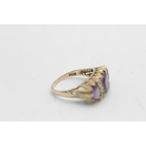 97 - A hallmarked London 9ct gold amethyst and clear gemstone gypsy ring, size P - approx. gross weight 4... 