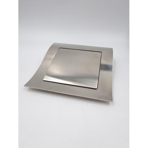 149 - A boxed Georg Jensen Wave stainless steel and rubber desk box - approx. 15cm x 15cm