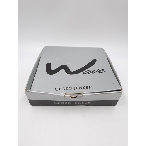 149 - A boxed Georg Jensen Wave stainless steel and rubber desk box - approx. 15cm x 15cm