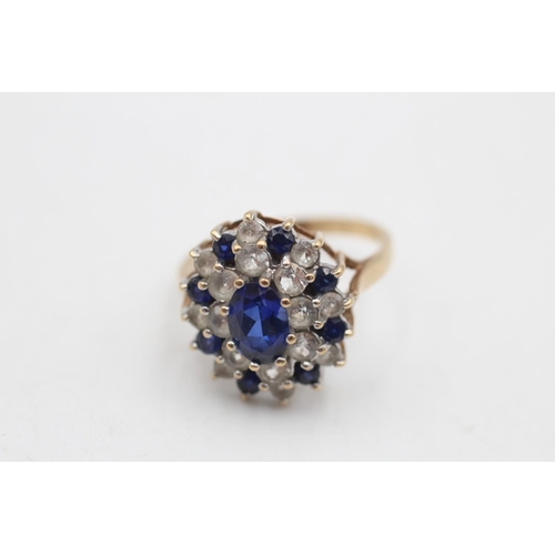 66 - A 9ct gold synthetic sapphire and spinel cocktail ring, size O½ - approx. gross weight 3.6 grams