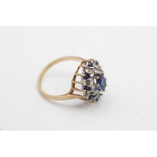 66 - A 9ct gold synthetic sapphire and spinel cocktail ring, size O½ - approx. gross weight 3.6 grams