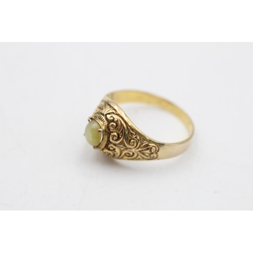 67 - A 9ct gold cat's eye chrysoberyl solitaire ornate dress ring, size S½ - approx. gross weight 2.7 gra... 