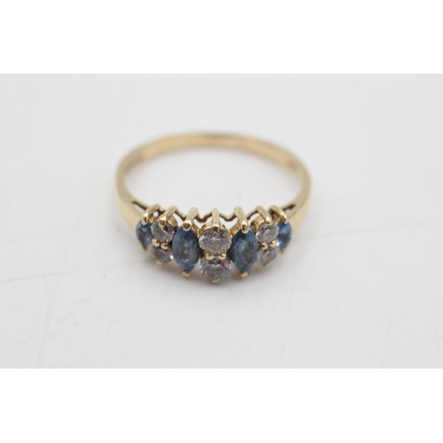 71 - A 14ct gold synthetic spinel and clear gemstone ten stone dress ring, size R - approx. gross weight ... 