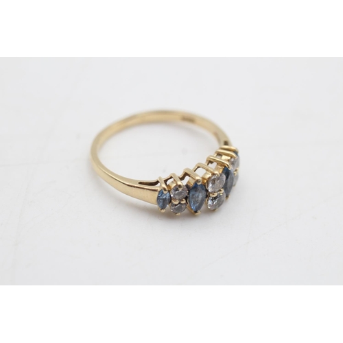 71 - A 14ct gold synthetic spinel and clear gemstone ten stone dress ring, size R - approx. gross weight ... 