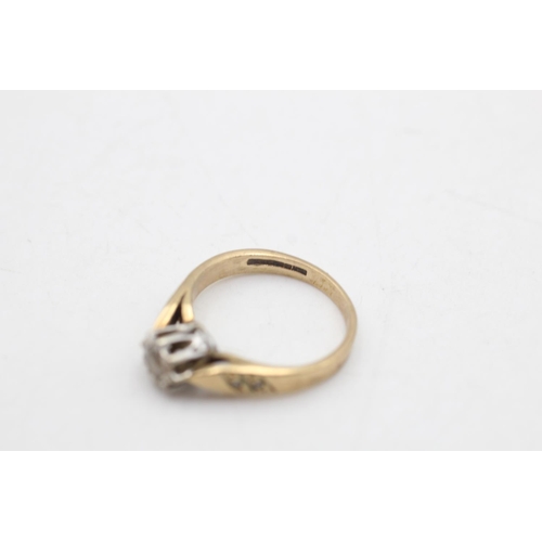 73 - A 9ct gold diamond solitaire ring, size J - approx. gross weight 2.2 grams