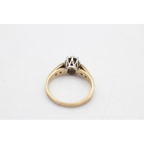 73 - A 9ct gold diamond solitaire ring, size J - approx. gross weight 2.2 grams