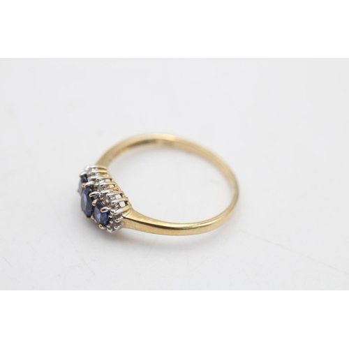 81 - A 9ct gold sapphire and diamond three stone halo dress ring, size R½ - approx. gross weight 2 grams