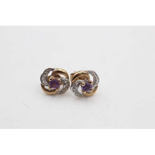 94 - Two pairs of 9ct gold gemstone and diamond twirl stud earrings, one ruby and one amethyst - approx. ... 