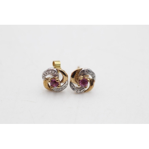 94 - Two pairs of 9ct gold gemstone and diamond twirl stud earrings, one ruby and one amethyst - approx. ... 
