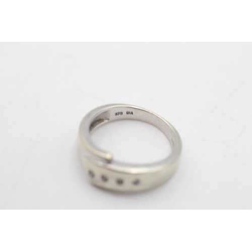 95 - A 9ct white gold diamond set cross over band ring, size M - approx. gross weight 4 grams