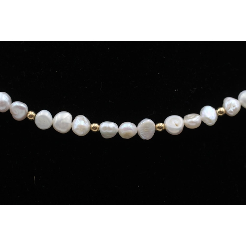 98 - A 14ct gold and freshwater pearl necklace - approx. gross weight 16.9 grams