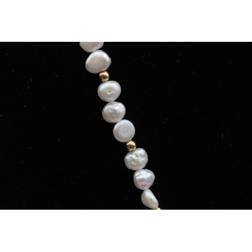 98 - A 14ct gold and freshwater pearl necklace - approx. gross weight 16.9 grams