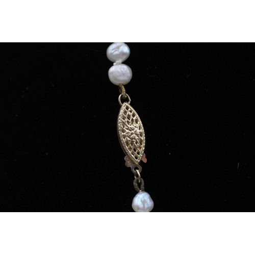 98 - A 14ct gold and freshwater pearl necklace - approx. gross weight 16.9 grams