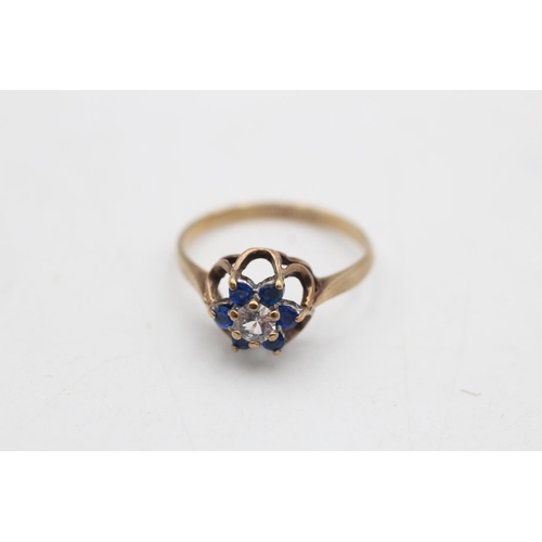 99 - A hallmarked Birmingham 9ct gold blue and clear gemstone floral cluster ring, size K½ - approx. gros... 