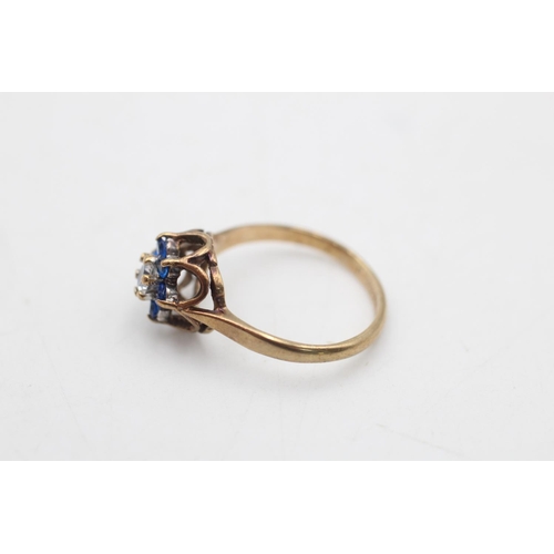 99 - A hallmarked Birmingham 9ct gold blue and clear gemstone floral cluster ring, size K½ - approx. gros... 