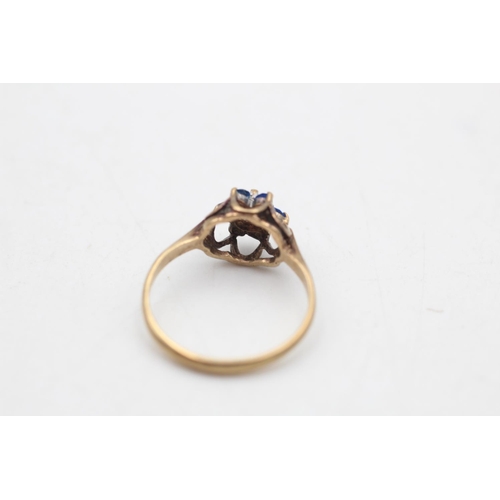 99 - A hallmarked Birmingham 9ct gold blue and clear gemstone floral cluster ring, size K½ - approx. gros... 