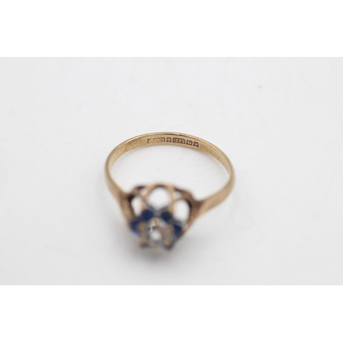 99 - A hallmarked Birmingham 9ct gold blue and clear gemstone floral cluster ring, size K½ - approx. gros... 