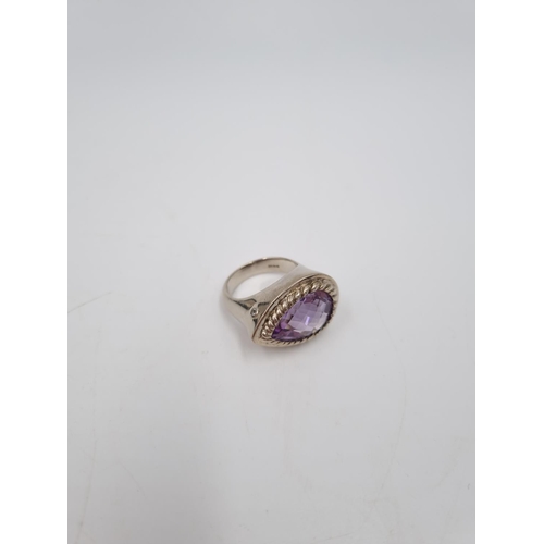 101 - A collection of .925 silver and white metal items to include three .925 silver bangles, Pandora char... 