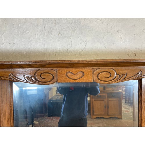 1135 - An Art Nouveau oak mirror back sideboard - approx. 167.5cm high x 151cm wide x 55.5cm deep