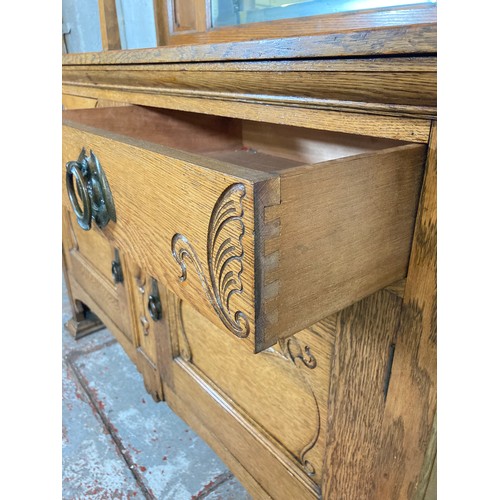 1135 - An Art Nouveau oak mirror back sideboard - approx. 167.5cm high x 151cm wide x 55.5cm deep