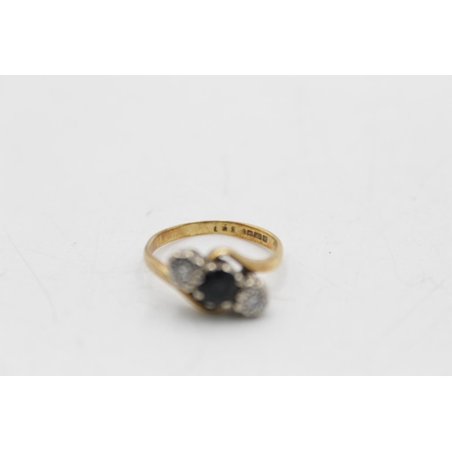 101 - A hallmarked Birmingham 18ct gold diamond and sapphire trilogy ring, size K - approx. gross weight 3... 